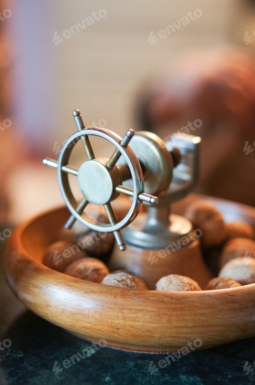 Preview: A Vertical Selective Focus Shot Of Classic Nutcracker On Wooden Bowl