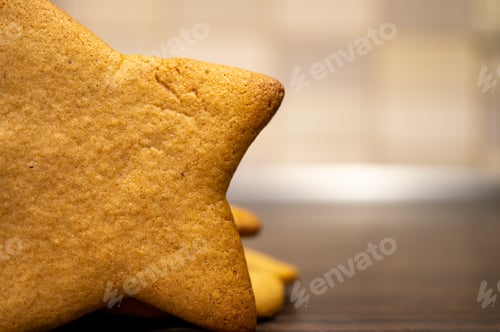 Preview: A Selective Focus Shot Of A Star Sha Ginger Cookie Leaning On Others On A Wooden Surface