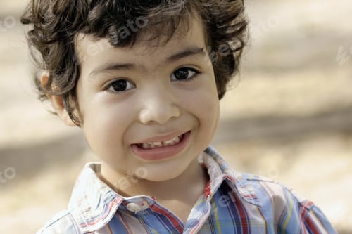 Preview: Young Happy Latin Kid Plays In An Outdoor Playground
