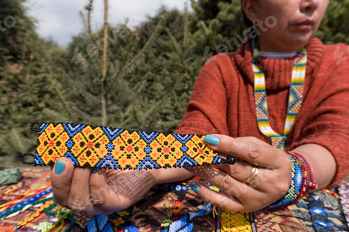 Preview: Hispanic Female Selling Huichol Art Outdoor