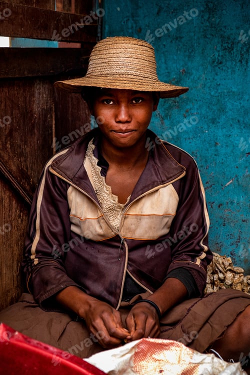 Preview: Ambalavao, Madagascar - Aug 18, 2019: A Girl Working In A Silk Factory In The City Of Ambalavao