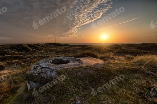Preview: A Breathtaking Shot Of A Beautiful Beach Hill On A Wonderful Sunset Background