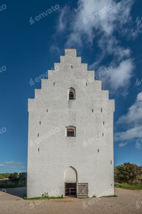 Preview: A Beautiful Shot Of A Den Tilsandede Kirke'S Building In Skagen, Denmarkz