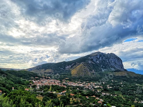 Preview: A Panoramic Shot Of The Mountain Range Of Monte Bulgaria And The Township Of San Giovanni A Piro