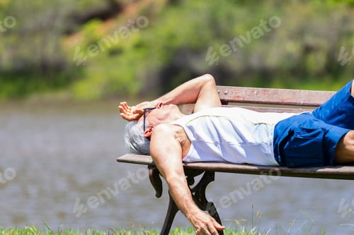 Preview: Portrait Of Senior Man Relaxing On Bench Outdoor