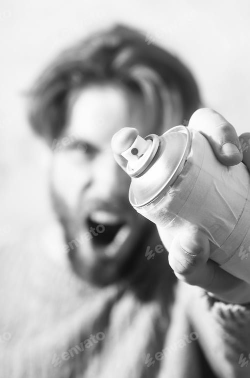 Preview: Aerosol Spray Paint Can Or Bottle In Hand Of Bearded Angry Man, Artist Or Painter With Blond Hair