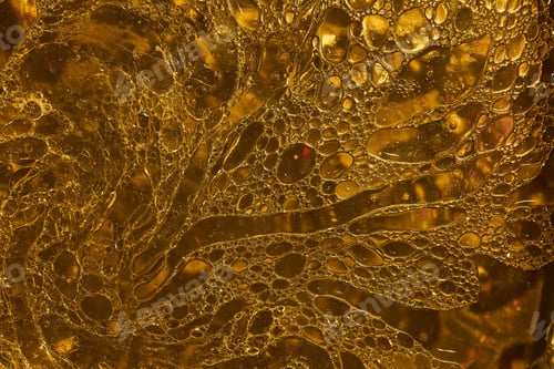 Preview: A Closeup Shot Of A Purple Water Surface With Bubbles