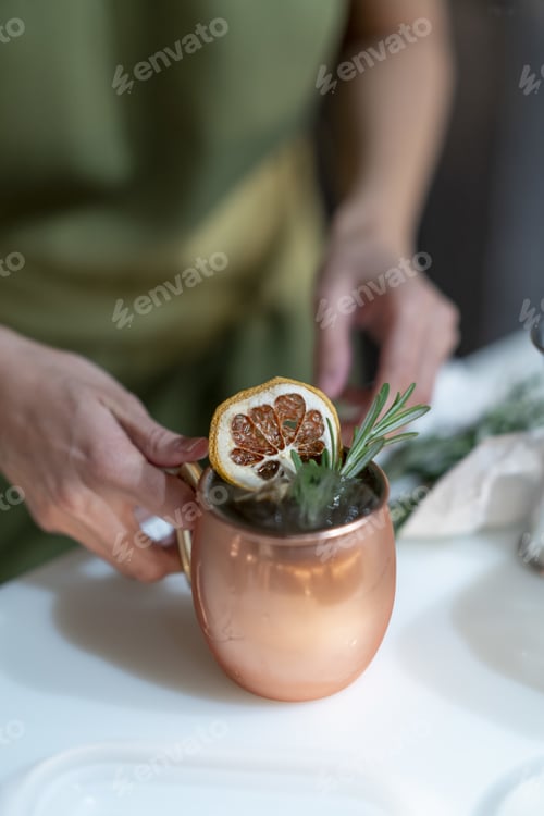 Preview: A Vertical Shot Of A Female Making An Exotic Cocktail
