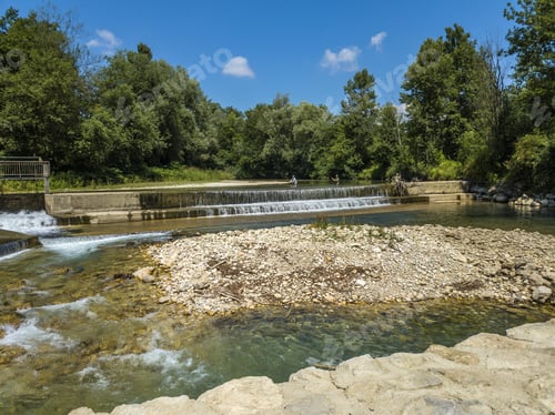 Preview: A Beautiful Flowing River On Background Of A Forest