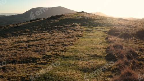 Preview: The Green Hills With Grass With The Sun Shining