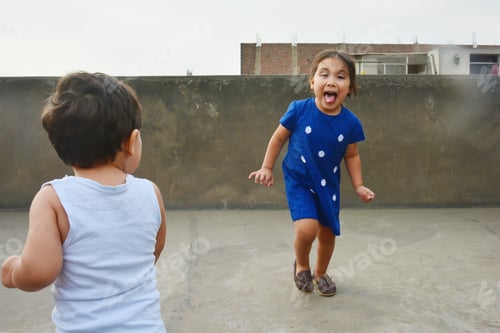 Preview: Little Latin Siblings Playing.