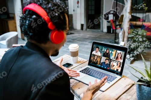 Preview: Back View Of Business Latin Man Talking To Her Mexican Colleagues In Video Conference Business Team