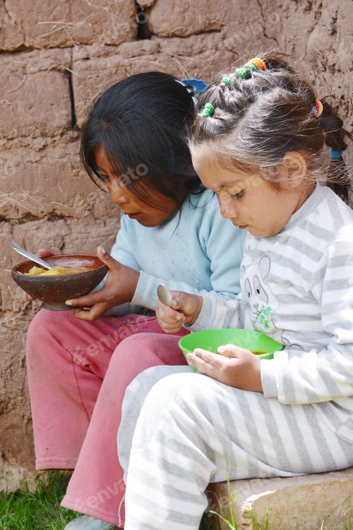 Preview: Native American Girls Eating. Adobe Bricks Background.