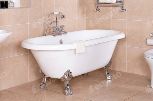 Preview: A Closeup Of A Luxury Vintage Bathtub With A Shiny Metal Faucet