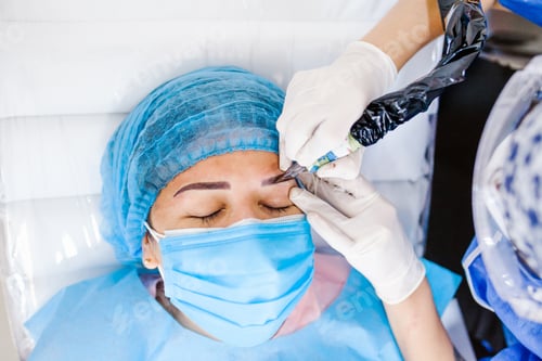 Preview: Latin Woman Beautician Doing Eyebrow Tattooing For Female, Facepermanent, Makeup For Eyebrows