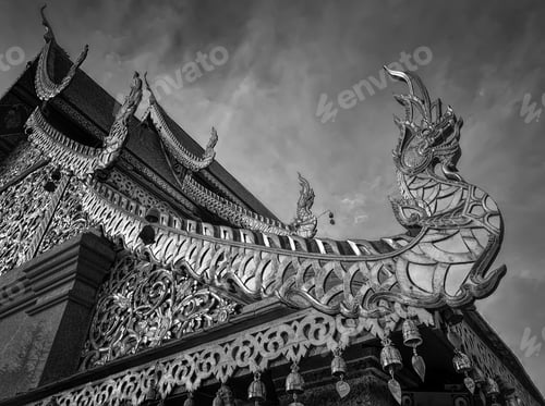 Preview: A Beautiful Low Angle Greyscale Shot Of A Historical Building With Sculptures Under The