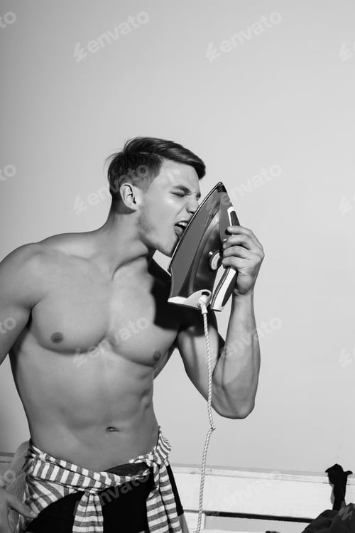 Preview: Everyday Life And Housework. Guy In Wardrobe. Man With Muscular Body Hold Iron. Housekeeping And