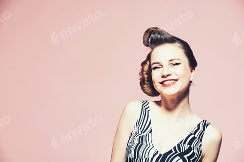 Preview: Happy Girl In Stylish Vintage Dress On Pink Background With With Retro Hair And Fashionable Makeup