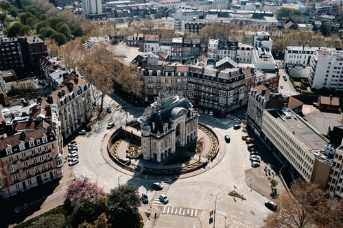 Preview: An Aerial Shot Of A Cityscape With A Lot Of Cars And Beautiful Buildings In Lille, France