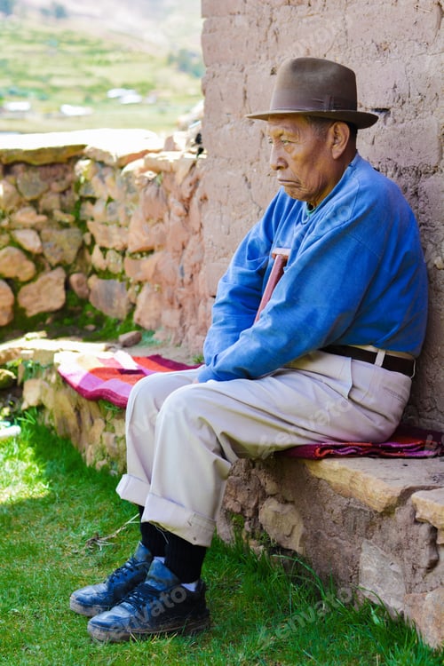 Preview: Serious Native American Old Man With Walking Stick In The Countryside.