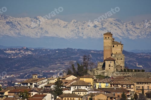 Preview: A Breathtaking Shot Of The Cityscape With The Background Of The Snow-Capped Mountains