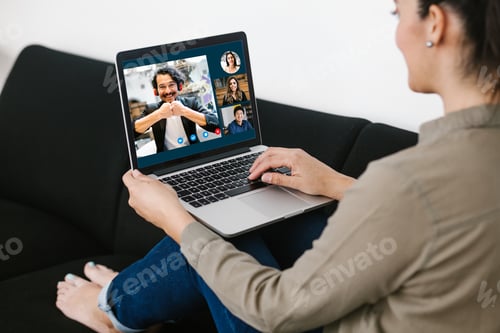 Preview: Back View Of Business Latin Woman Talking To Her Mexican Colleagues In Video Conference Business