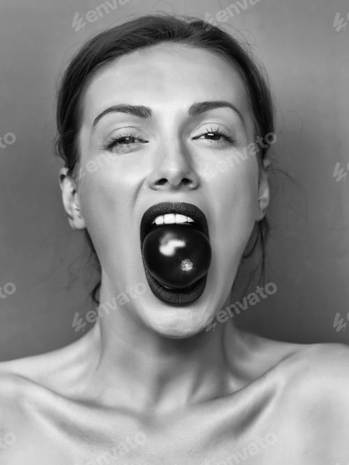 Preview: Young Cute Woman Or Girl Portrait With Red Tomato In Sexy Lips On Pretty Face And Brunette Hair Has