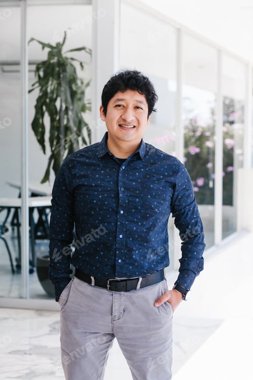 Preview: Latin Man Portrait Looking To Camera Outside Office In Mexico City
