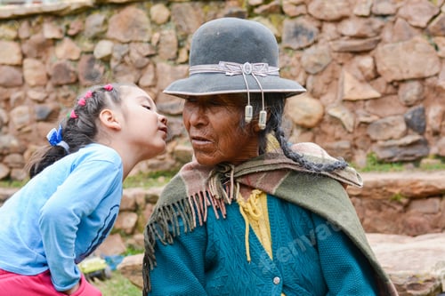 Preview: Little Latin Girl Kissing Her Native American Grand Grandmother.