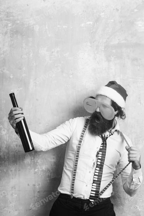 Preview: New Year Guy With In Hat. Santa Claus Man With Wine Bottle. Party And Alcohol Drink. Holiday And