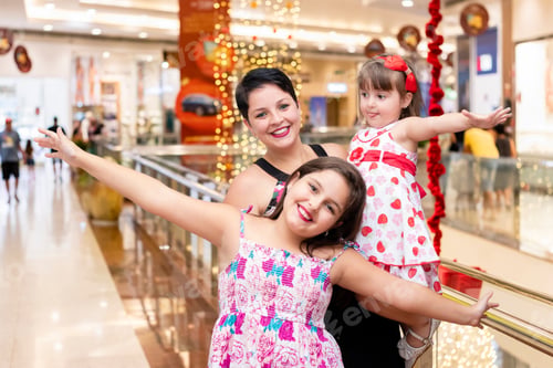 Preview: Portrait Of Mother And Daughters At The Mall