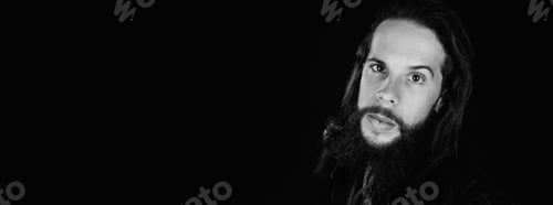 Preview: Studio Photography With Black Background Of A Hipster Style Man Wearing Leather Jacket.