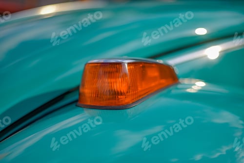 Preview: A Closeup Of The Orange Turn Signal Of A Car