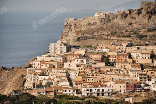 Preview: A Beautiful Shot Of Buildings On The Hill With A Sea In The Background At Daytime