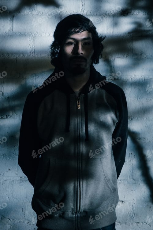 Preview: Portrait Of Young Man With Beard Wearing Shirt And Shades Of Trees In The Park