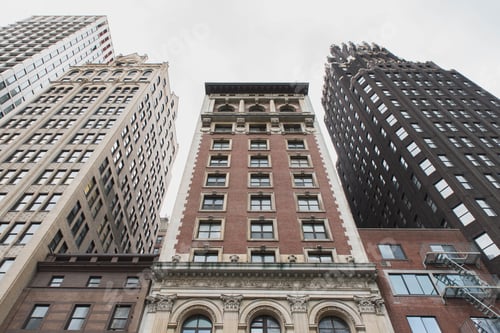 Preview: A Low Angle Shot Of Tall Brown Buildings In New York City