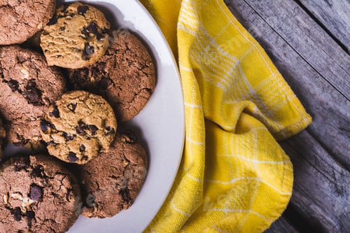 Preview: Fresh Chocolate Chip Cookies on a White Plate