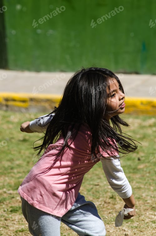 Preview: Little Girl Playing Happily In The Park Running