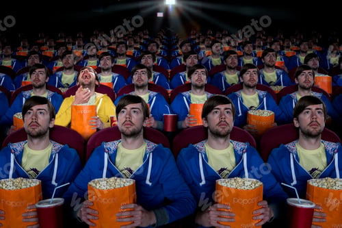 Preview: Cloned Audience Watching Movie In Theater Showing The Concept Of Standing Out From The Crowd.