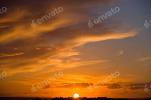 Preview: Beautiful Sky Painted By The Sun Above Horizon Leaving Bright Golden Shades.