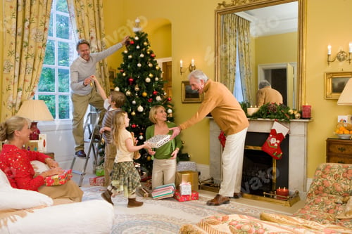 Preview: Horizontal Shot Of A Happy Family In The Living Room Enjoying Christmas Vacation.