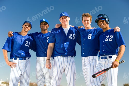 Preview: Mid-Length Shot Of A Smiling Portrait Of A Baseball Team In Blue Uniforms Standing Side By Side.