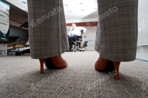 Preview: Selective Focus On Close-Up Of Heels Of A Businesswoman Facing Towards Showing Agreement On Office