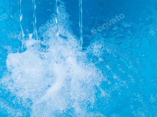 Preview: Background Of Bubbles In The Blue Water Of A Swimming Pool On A Bright Sunny Day With Copy Space.