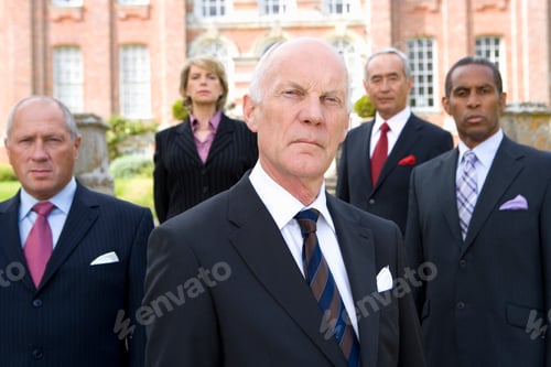 Preview: Horizontal Shot Of A Multi-Ethnic Group Of Five Business People Standing In Front Of A Manor
