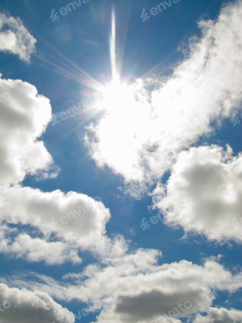 Preview: The Sun Shines Bright In The Daytime In Summer With Fluffy Clouds In The Blue Sky.