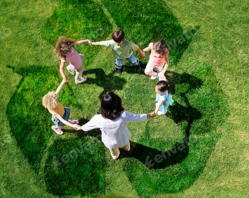 Preview: Overhead Shot Of Teacher With Five Young Students In A Circle Forming A Human Chain Play On A Green