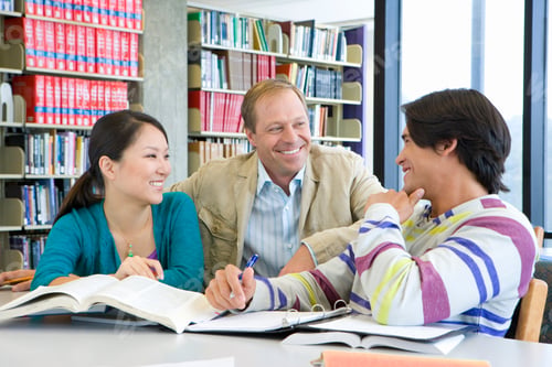 Preview: Group Of Friends Studying In The Library And Looking At Each Other.