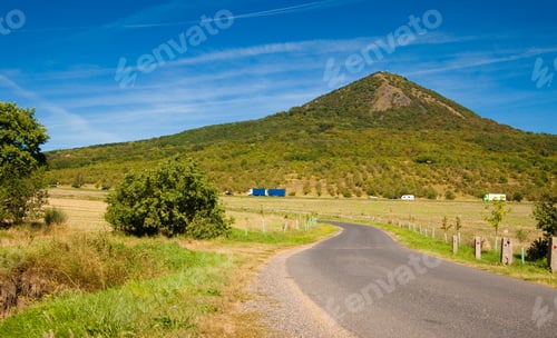 Preview: Cars On The Road In A Mountain Landscape