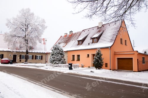 Preview: Snow Covered Houses on a Street in Winter